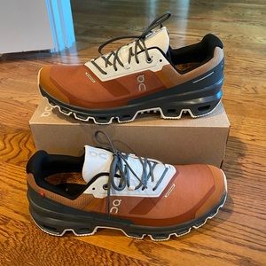 On Running Athletic Shoes in Brown and White